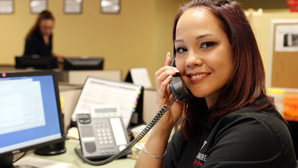 Call center representative wearing headphones